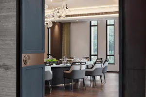 Modern restaurant interior with contemporary furniture and lighting.