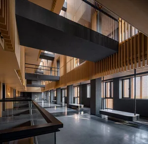 Industrial-style office space featuring wooden materials.
