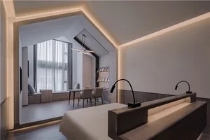 A modern contemporary bedroom with mixed materials including wood, metal, and fabric.
