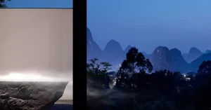 A serene view of mountains during nighttime with a misty atmosphere.