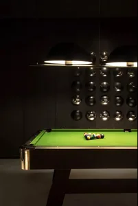 Industrial-style metal pool table with green felt