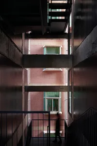 Modern apartment building with concrete walls and glass windows