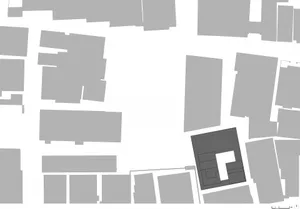 A grayscale architectural floor plan of an urban development project showing various buildings and streets.