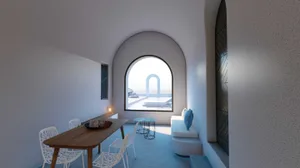 Modern minimalist living room featuring concrete walls and a large curved window.