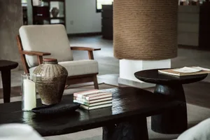 A modern industrial interior with wood furniture and minimalist design.
