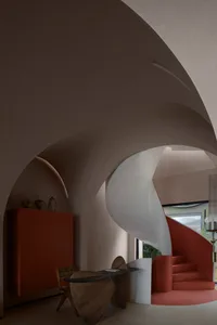 A modern interior design featuring a concrete staircase and arches.