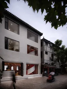 A modern retail space with concrete and glass materials.