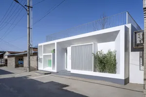 A modern building with a concrete exterior.