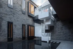 A modern building exterior constructed of brick.