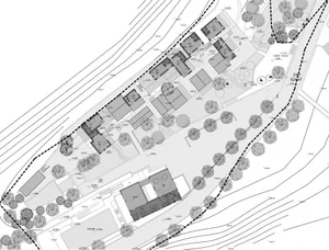 Floor plan of a housing development showing buildings, pathways, and landscaping.