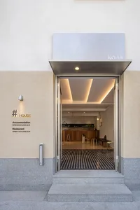 Modern hotel entrance featuring concrete and metal materials