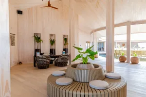 Modern interior design featuring wooden elements and contemporary furniture.