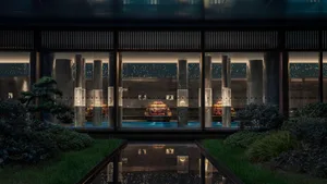 Modern hotel suite featuring glass columns in a sleek, contemporary design.