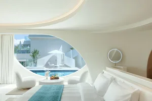 A modern bathroom with glass features and a contemporary design.