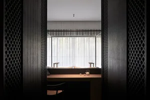 Modern interior design home office with minimalist furniture and natural light.