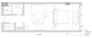 Floor plan of a modern apartment layout with minimalist design elements.