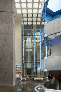 Modern industrial design lobby with metallic and glass elements