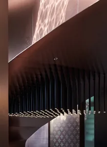 Modern interior design featuring metal lighting elements.