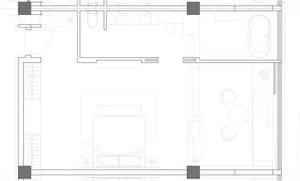 Modern apartment floor plan showing living room, bedroom, kitchen, and bathroom.