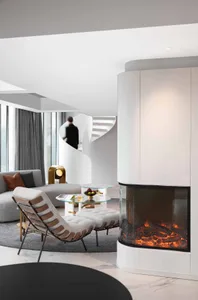 Modern living room featuring a white marble fireplace and contemporary furniture.