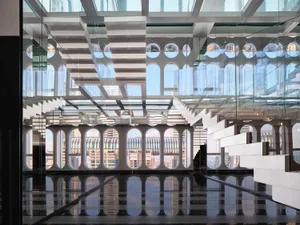Modern office lobby with glass walls and steel accents