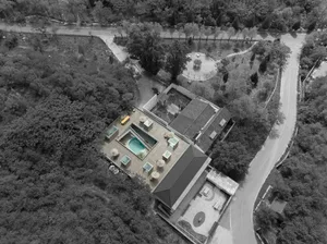 Aerial view of a modern residential architectural plan featuring concrete materials.