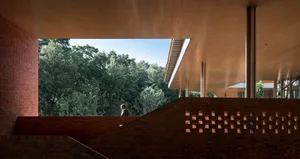 A modern office with brick stairs and concrete walls.