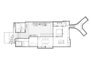 Floor plan of a modern residential home showcasing a combination of concrete, glass, and wood materials.