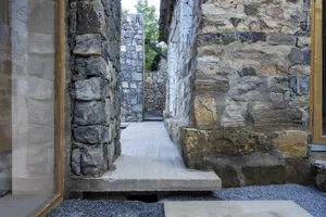 Stone, concrete, and gravel pathway interior