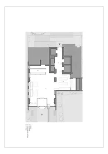 Floor plan layout of an architectural design on paper.