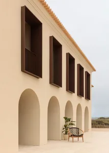 A minimalist building with concrete exterior features.