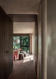 Minimalist residential interior with concrete and wooden elements