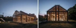 Modern house exterior with glass and wooden structures, illuminated during dusk.