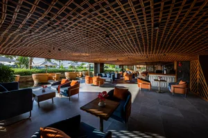 Modern lounge area with polished concrete flooring and contemporary seating