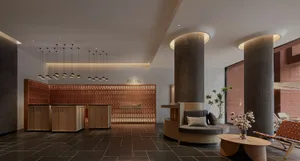 Modern hotel lobby with concrete pillars, walnut furniture, and hanging lights.