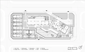 Modern residential complex layout with concrete, glass, and metal materials.