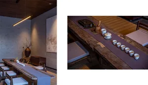 A modern tea room featuring wooden furniture and minimalist design.