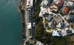 Aerial view of modern residential buildings with concrete exteriors.