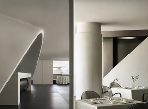 Modern restaurant interior with concrete walls and minimalist design