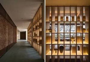 Modern display case featuring wooden shelving with illuminated shelves and decorative items.