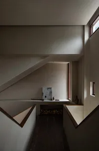 A modern staircase made of concrete with minimalist design elements.