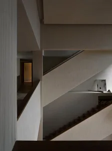 Modern staircase with concrete and wood materials