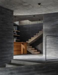 Concrete architecture interior design featuring minimalist design elements and structural elements.