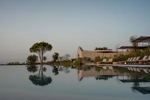 Modern architecture featuring concrete ground, perfect for vacation rentals.