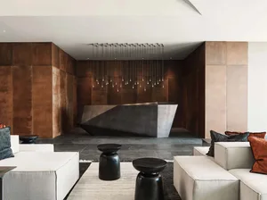 Modern lobby featuring metallic interior design elements.
