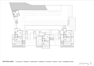 2nd floor plan of a building with labeled rooms and spaces.