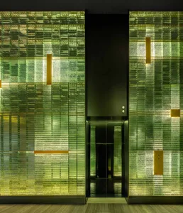 A minimalist design featuring a modern hotel doorway with a glass panel