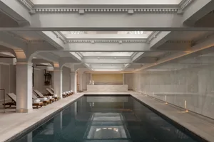 Modern spa interior with marble, glass, and concrete elements