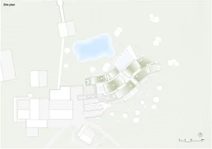 A detailed topographical map of a site with buildings, structures, and vegetation depicted in white on a pale green backgroun