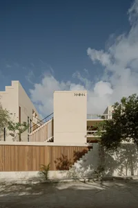 A modern building with a minimalist design, constructed from concrete.